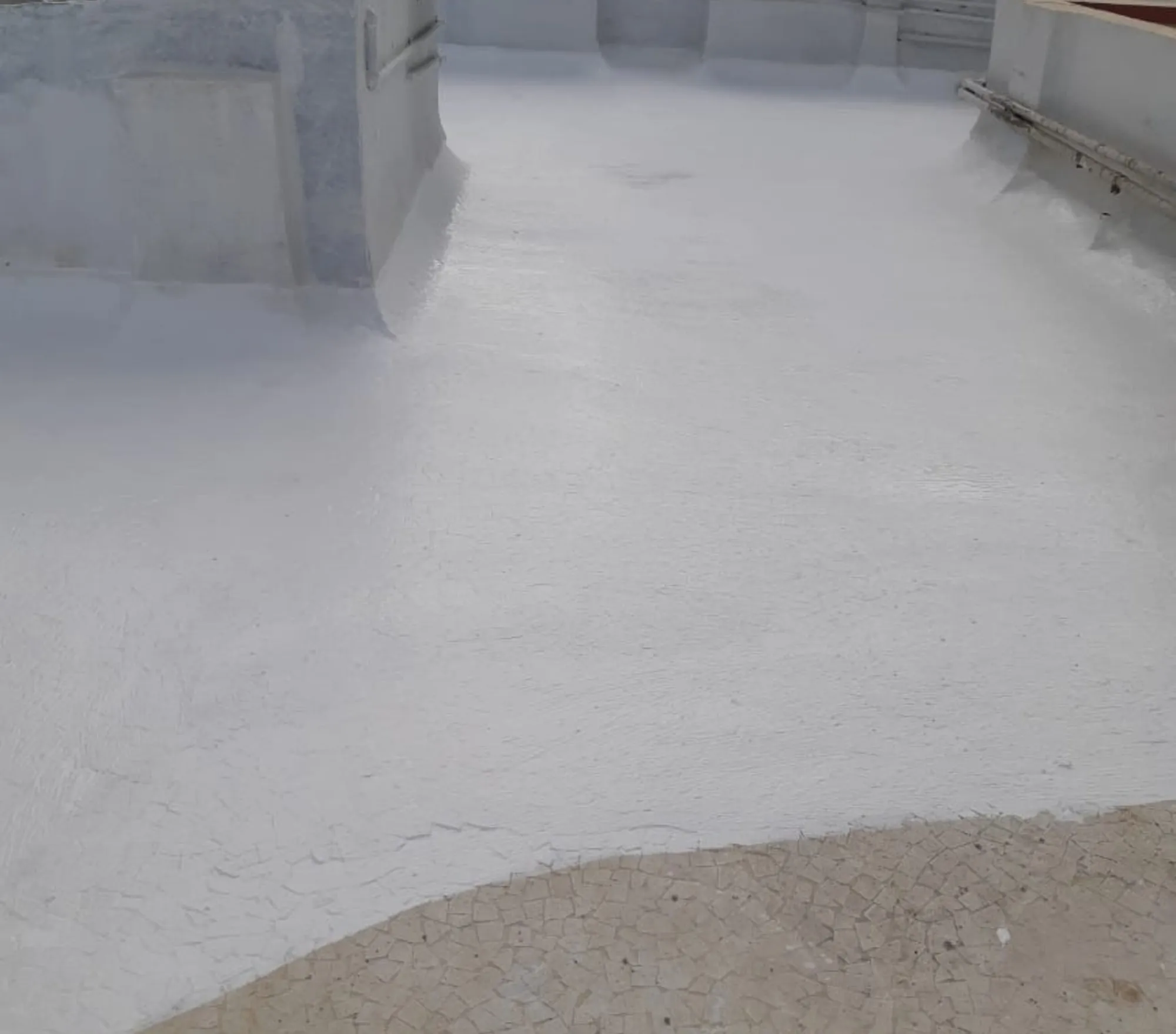 Wall treated for seepage before re-plastering with a waterproofing admixture — Mahadev Waterproofing