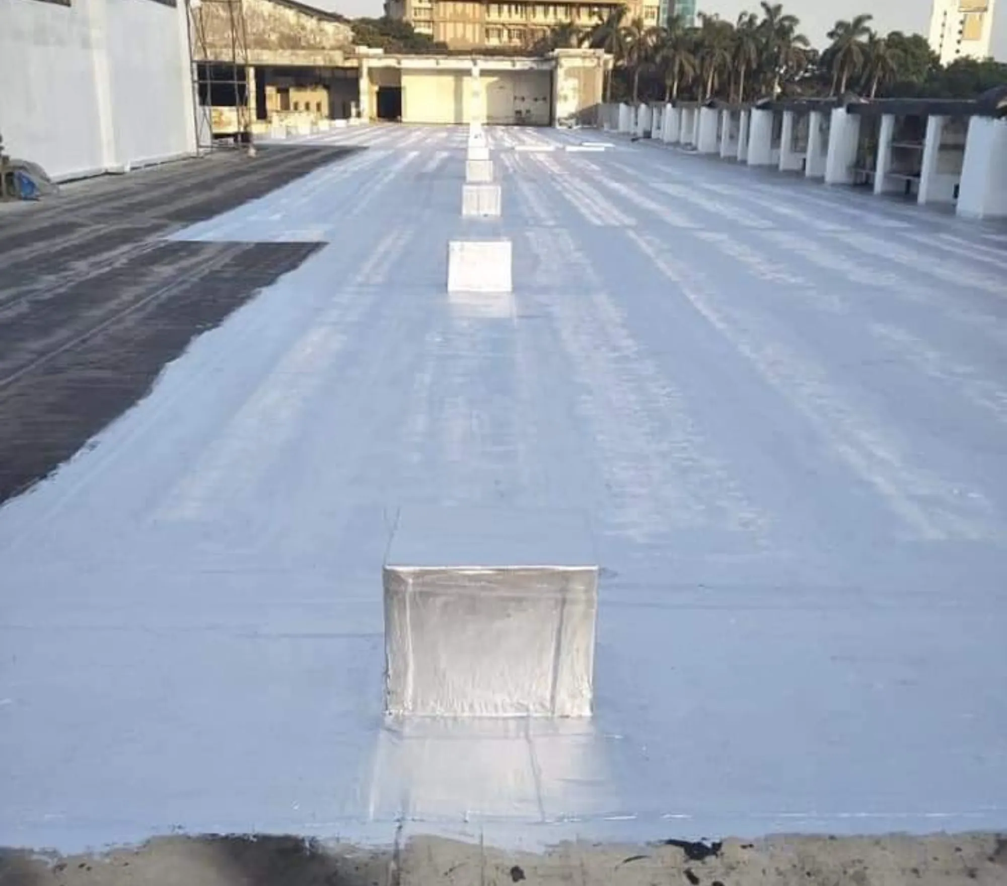 Reflective silver coating over a finished membrane — Mahadev Waterproofing